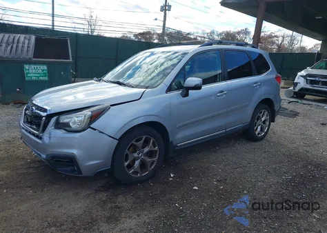 2017 Subaru Forester 2.5I Touring z USA, uszkodzony, nr VIN JF2SJAWC6HH464003